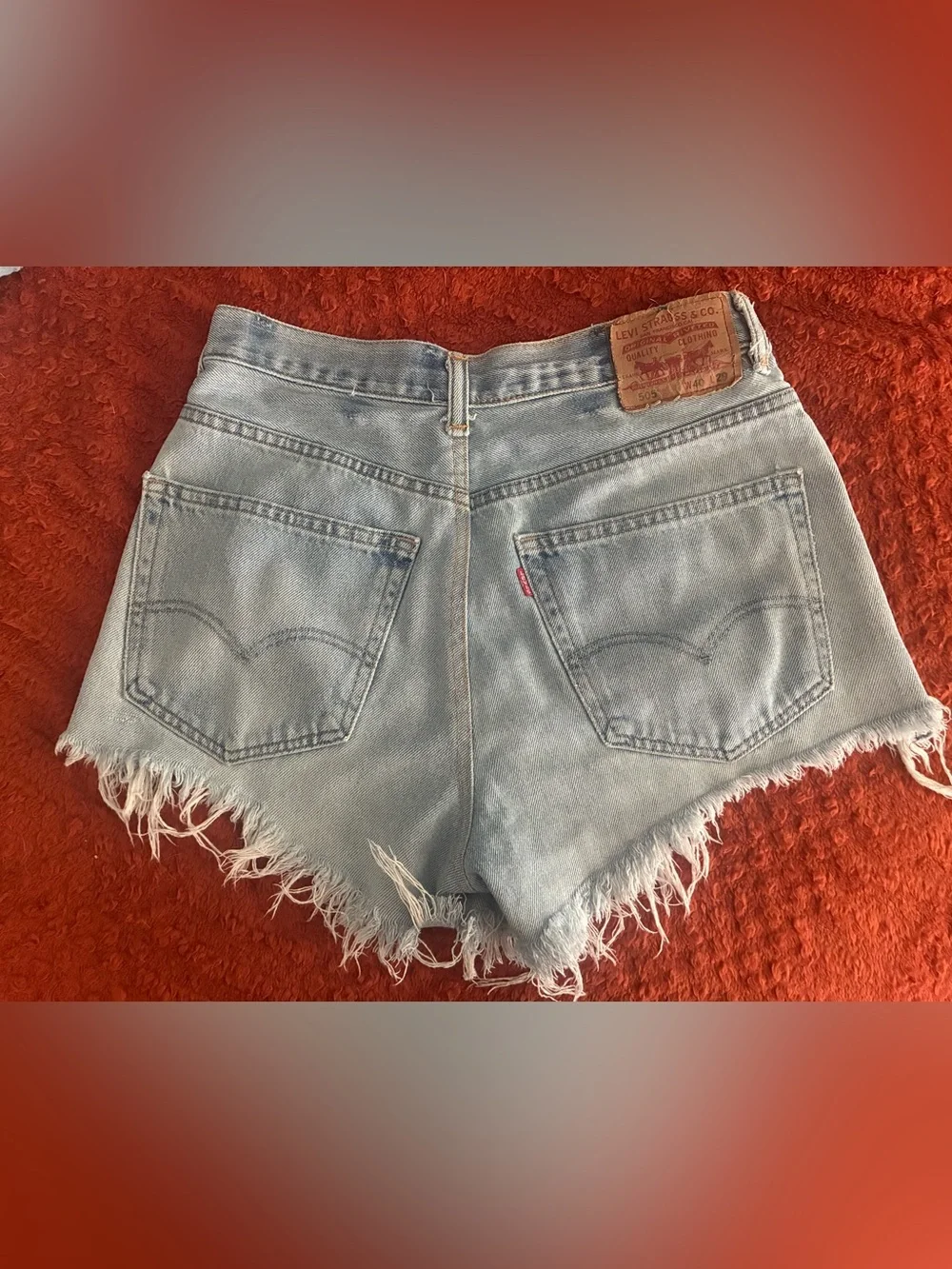 Levi’s 501 High-Waist Distressed Light Blue Denim Shorts